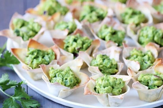 Guacamole Cups - St. Patrick's Day Appetizer Recipes #irishrecipes #stpatricksdayrecipes #avocadorecipes